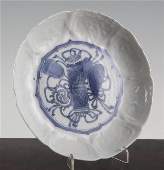A Chinese Kraak blue and white petal lobed dish, early 17th century, 20cm, rim crack